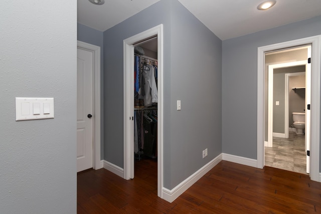 1012 W Monarch Dr, Nixa, MO 65714 - hallway featuring dark wood-style flooring and recessed lighting