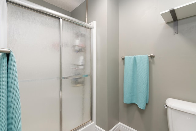 1012 W Monarch Dr, Nixa, MO 65714 - full bath with a shower with shower door and toilet