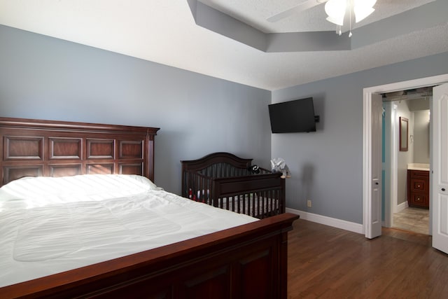 1012 W Monarch Dr, Nixa, MO 65714 - bedroom with dark wood finished floors and ceiling fan