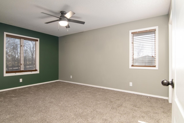 1012 W Monarch Dr, Nixa, MO 65714 - carpeted empty room with a ceiling fan and a textured ceiling