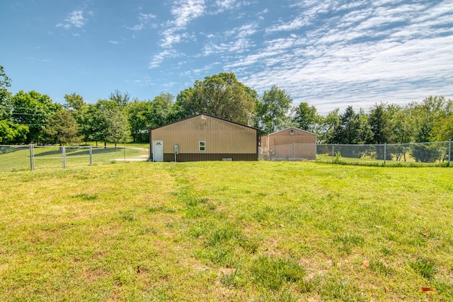 1012 W Monarch Dr, Nixa, MO 65714 - view of yard with a pole building, view of scattered trees, and an outbuilding