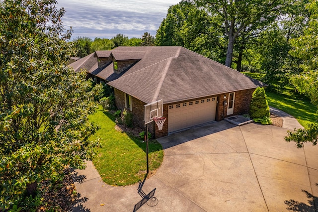 1012 W Monarch Dr, Nixa, MO 65714 - view of subject property featuring a tree filled landscape