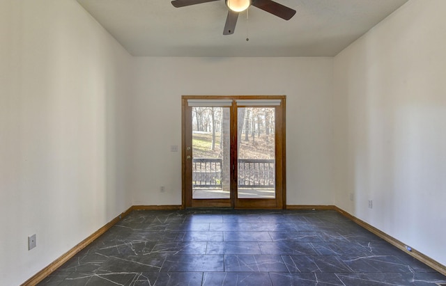 unfurnished room with ceiling fan