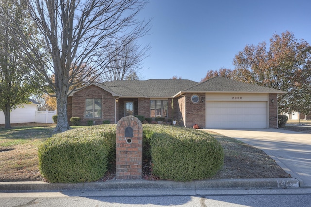 single story home with a garage