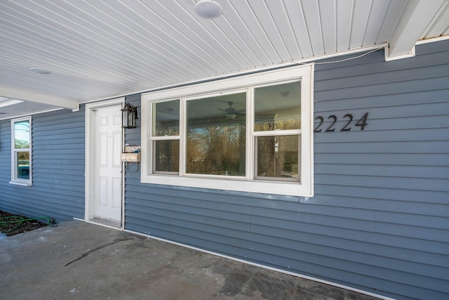 property entrance featuring a patio area