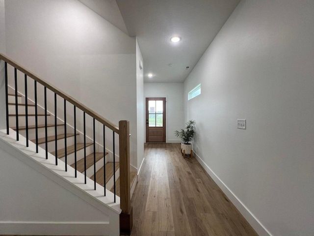 entryway with wood-type flooring