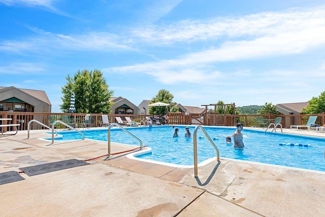 view of swimming pool featuring a patio