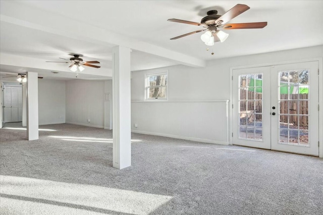 interior space featuring a wealth of natural light, french doors, and carpet floors