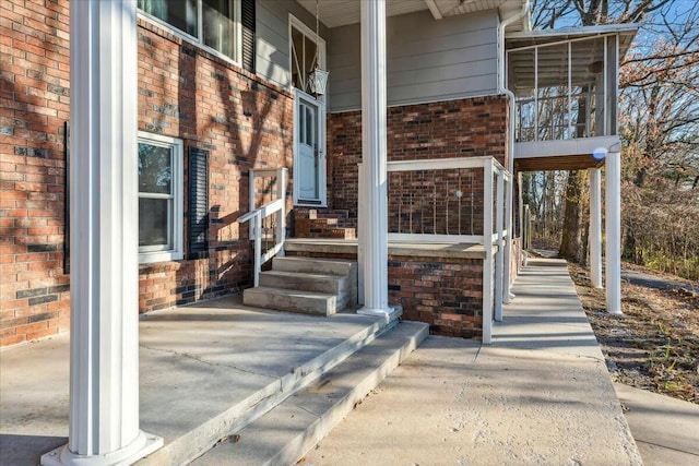 doorway to property featuring covered porch