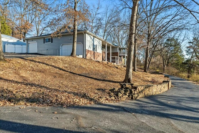 exterior space with a garage