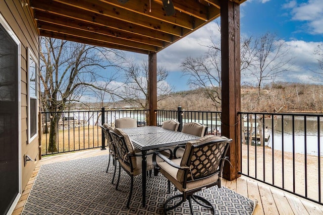 deck featuring a water view