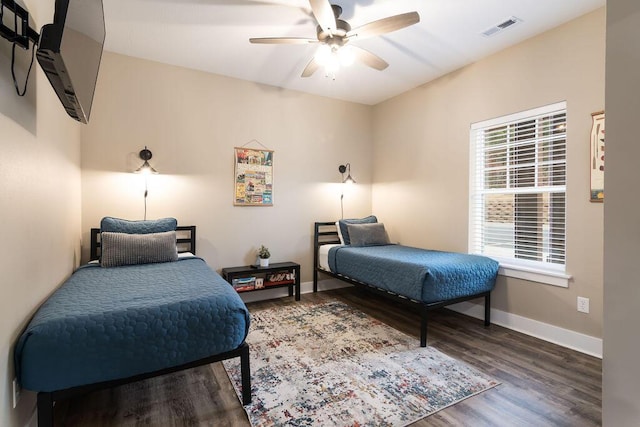 bedroom featuring hardwood / wood-style flooring and ceiling fan