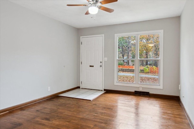 spare room with ceiling fan and light hardwood / wood-style flooring