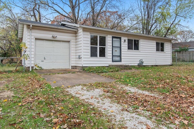 single story home featuring a garage