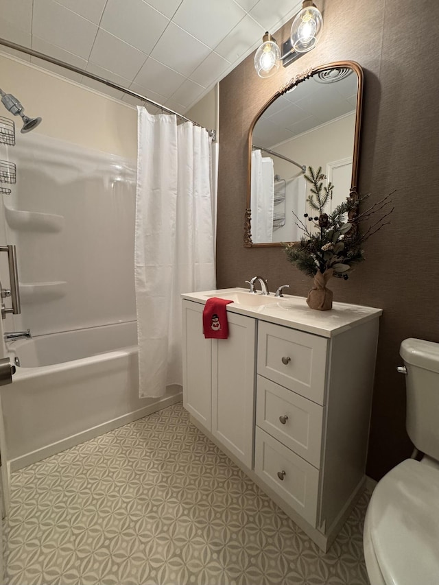 full bathroom featuring vanity, toilet, and shower / bathtub combination with curtain