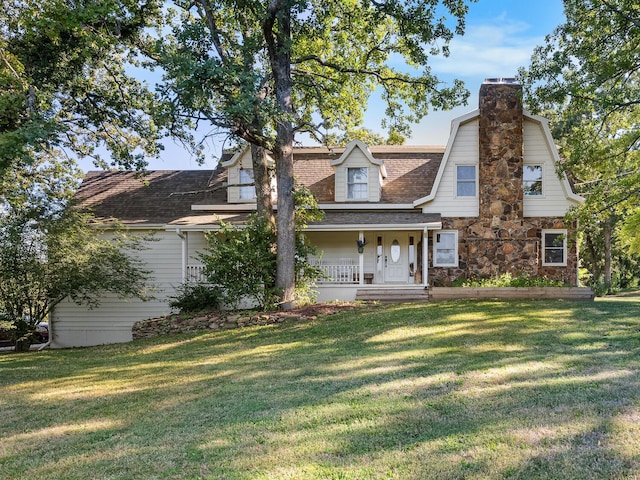 view of front of home featuring a front lawn and a porch