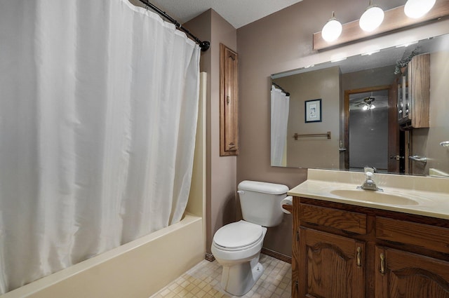 full bathroom featuring vanity, shower / bath combination with curtain, a textured ceiling, and toilet