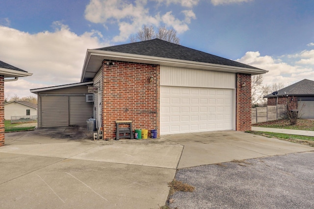 view of side of property featuring a garage