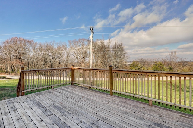 wooden deck with a yard