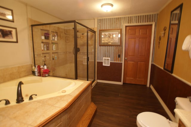 bathroom featuring crown molding, hardwood / wood-style floors, independent shower and bath, and toilet