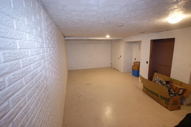 basement with a textured ceiling