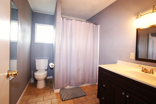 bathroom featuring vanity, toilet, curtained shower, and crown molding