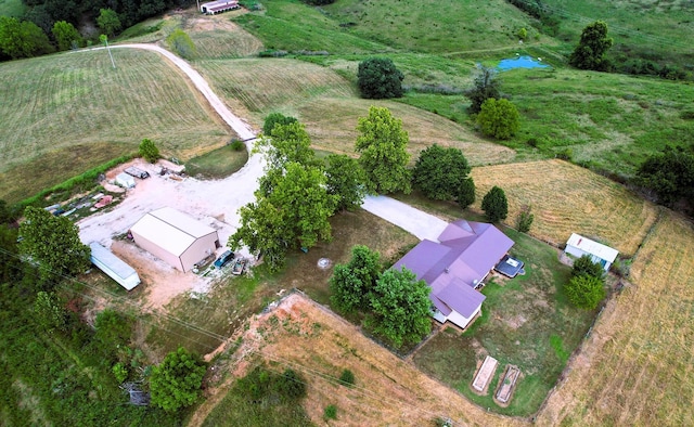 bird's eye view with a rural view and a water view