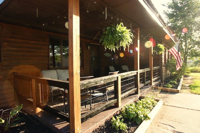 view of property exterior featuring a porch