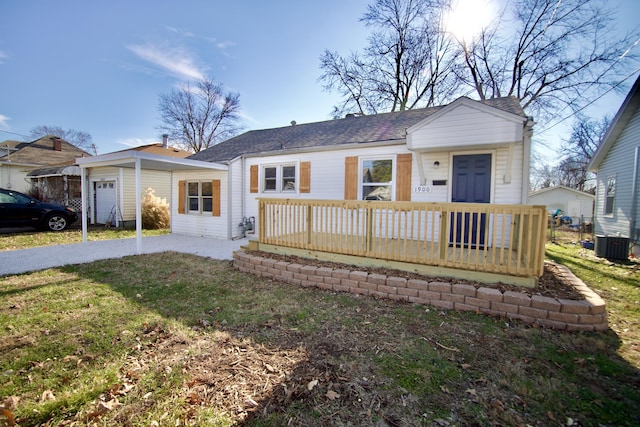 single story home featuring a porch, central air condition unit, and a front yard