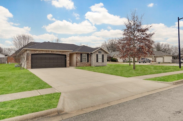 ranch-style home with a garage and a front lawn