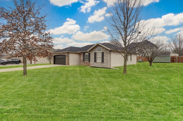 ranch-style house featuring a front yard and a garage