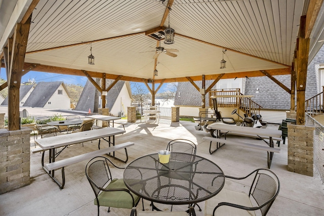 view of patio / terrace featuring a gazebo and ceiling fan