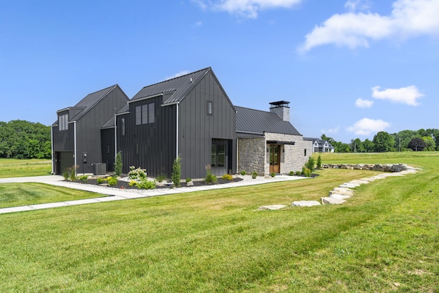 view of property exterior featuring a lawn and cooling unit