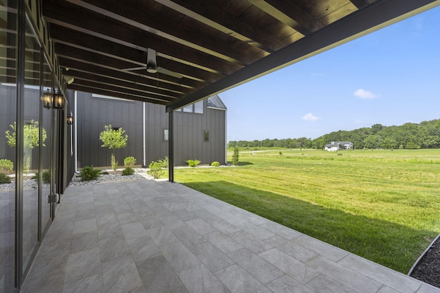 view of patio with ceiling fan