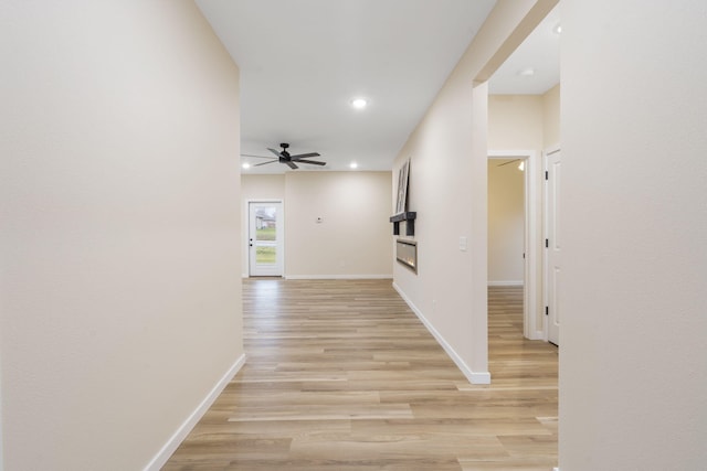 hallway featuring light wood-type flooring