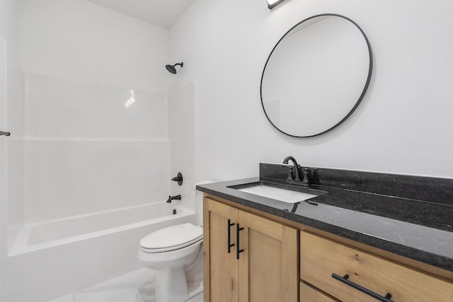 full bathroom featuring vanity, tub / shower combination, and toilet