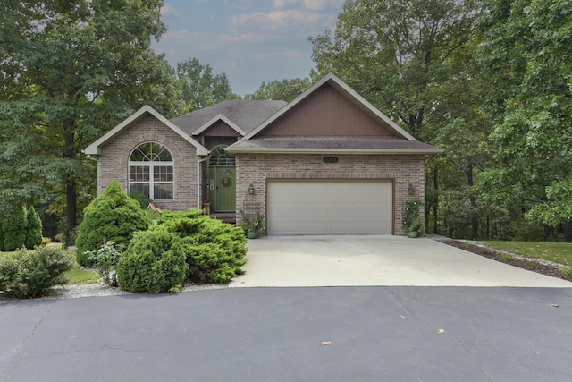 ranch-style house featuring a garage