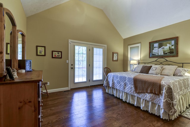 bedroom with a textured ceiling, access to exterior, dark wood-type flooring, and vaulted ceiling