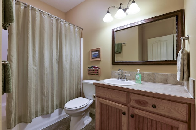 full bathroom featuring tile patterned floors, vanity, shower / bath combination with curtain, and toilet