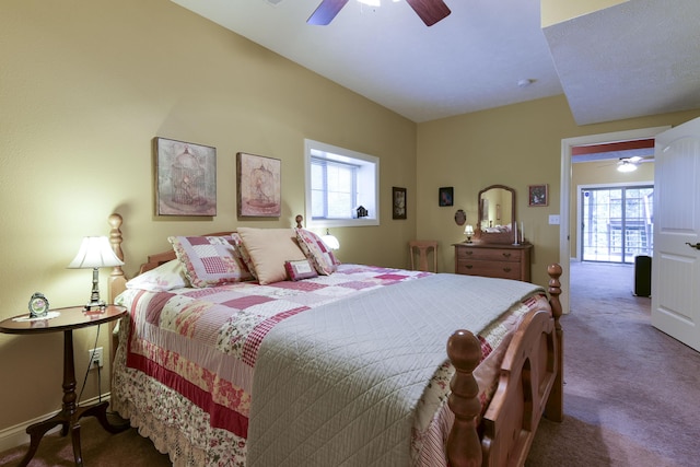 carpeted bedroom featuring ceiling fan and multiple windows