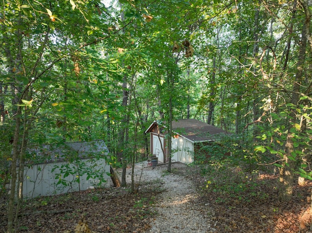 exterior space with a storage shed