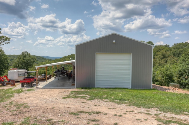 garage with a carport