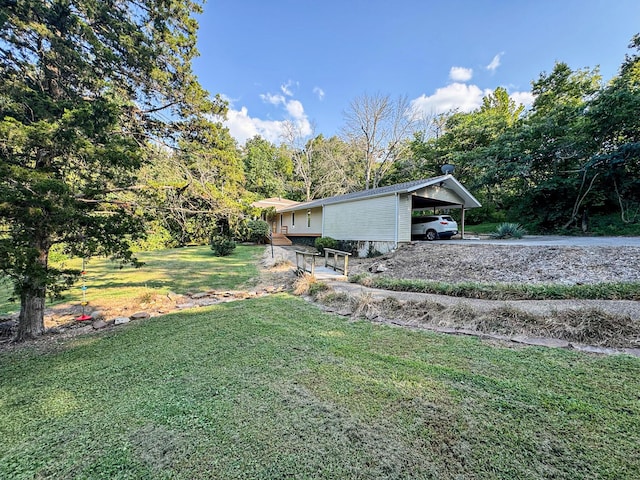 view of yard featuring a carport