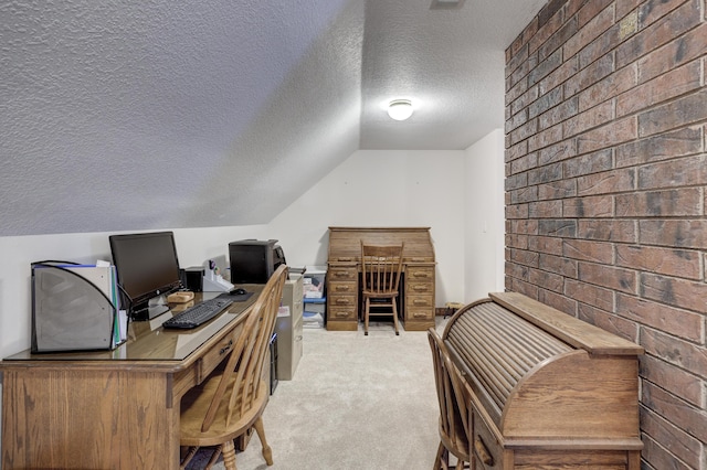 carpeted home office featuring lofted ceiling and a textured ceiling