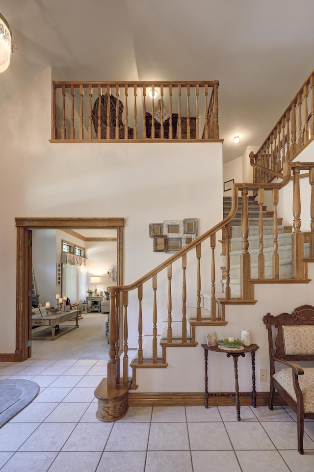 stairway with tile patterned flooring