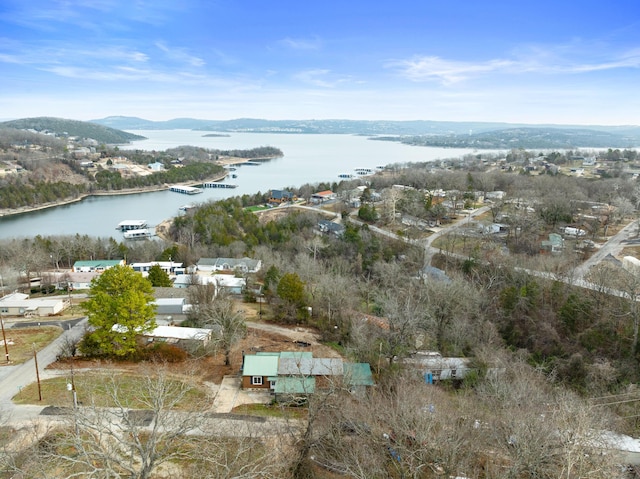 bird's eye view with a water and mountain view