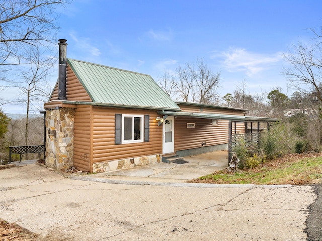 29 Adams Ln, Blue Eye, MO 65611 - rustic home featuring a metal roof, a chimney, and faux log siding