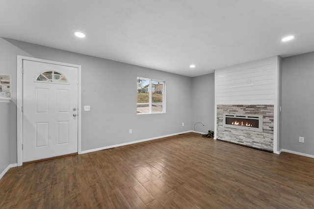 29 Adams Ln, Blue Eye, MO 65611 - unfurnished living room featuring a fireplace, dark wood-style floors, and recessed lighting