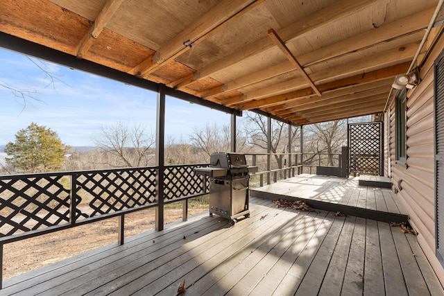 wooden deck featuring area for grilling