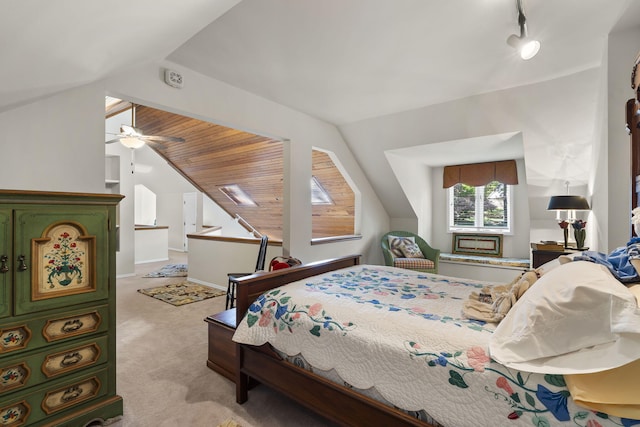 bedroom with light carpet, wooden ceiling, ceiling fan, and lofted ceiling